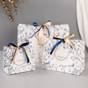 Vibrant CMYK Printed Paper Gift Bags for Professional Branding