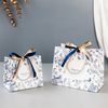 Vibrant CMYK Printed Paper Gift Bags for Professional Branding